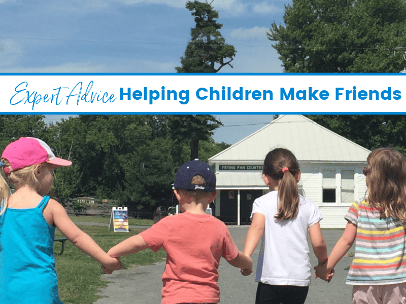 Four children walking hand in hand, exemplifying friendship and unity